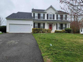 Cheerful 4 bedroom home with fireplace.